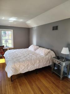 Postel nebo postele na pokoji v ubytování Pomfret Cottage