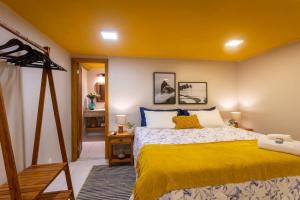 Ένα ή περισσότερα κρεβάτια σε δωμάτιο στο Ferradura Dream Suite +5 φωτογραφίες