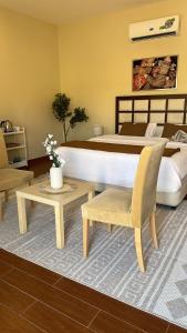 Postel nebo postele na pokoji v ubytování AL hawiyah camp