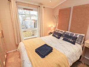 Postel nebo postele na pokoji v ubytování Rosie's Zen Den