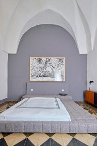 Ένα ή περισσότερα κρεβάτια σε δωμάτιο στο Agave Urban Oasis in Matino