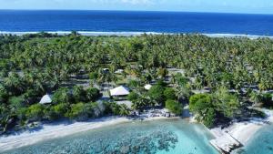 an aerial view of a resort on the beach at Monita Villa Rangiroa in Tiputa