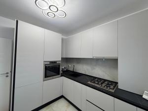 Kuchyň nebo kuchyňský kout v ubytování Claudia MG