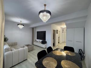 TV a/nebo společenská místnost v ubytování Claudia MG