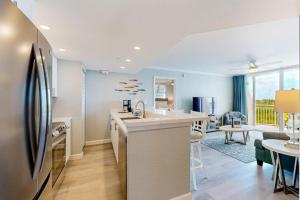 Kuchyň nebo kuchyňský kout v ubytování The Saint Kitts Suite - Sunrise Suites