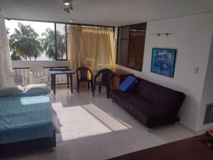 Posezení v ubytování barato en frente de mar