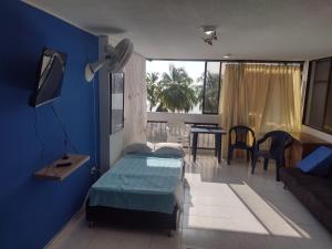 TV a/nebo společenská místnost v ubytování barato en frente de mar