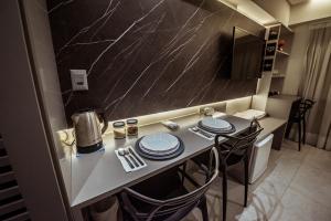 Posezení v ubytování Flat Beira-mar c Piscina e Academia em Manaira