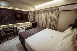 Postel nebo postele na pokoji v ubytování Flat Beira-mar c Piscina e Academia em Manaira + 23 fotografií