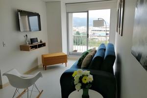 Μια τηλεόραση ή/και κέντρο ψυχαγωγίας στο Ejecutivo con vista natural, Parking, Wifi, Cajicá