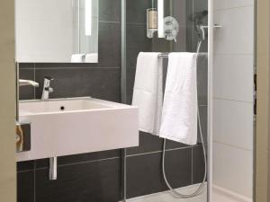 Koupelna v ubytování Mercure Grenoble Centre Porte des Alpes + 218 fotografií