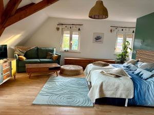 Posezení v ubytování Gîte le Nid