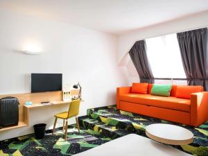 TV a/nebo společenská místnost v ubytování Ibis Styles Budapest Center