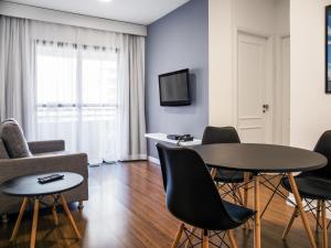 TV a/nebo společenská místnost v ubytování Mercure Sao Paulo Berrini + 113 fotografií