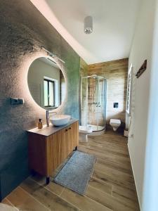 a bathroom with a sink and a mirror at Alba Abruzzo in Fossacesia
