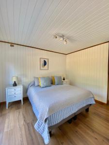 Postel nebo postele na pokoji v ubytování Cabañas Los Robles + 2 fotografie