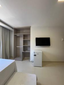 Μια τηλεόραση ή/και κέντρο ψυχαγωγίας στο Marauí Guest House