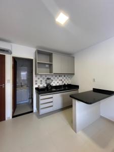 Η κουζίνα ή μικρή κουζίνα στο Marauí Guest House