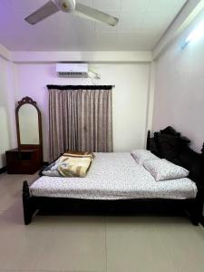 Ένα ή περισσότερα κρεβάτια σε δωμάτιο στο 5-Star Hospitality with a Heart +12 φωτογραφίες