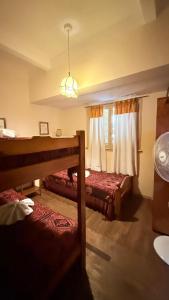 Postel nebo postele na pokoji v ubytování Hotel Nueva Marbella