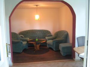 Posezení v ubytování Kinkerbungalow