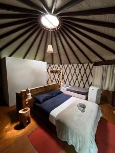 Postel nebo postele na pokoji v ubytování Nômades Vibe da Ilha - Adventure Hostels