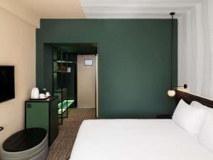 Postel nebo postele na pokoji v ubytování Novotel Cairo 6th Of October