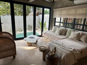 Postel nebo postele na pokoji v ubytování Las chozas I