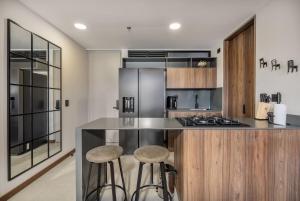 Kuchyň nebo kuchyňský kout v ubytování New Luxury Apartment