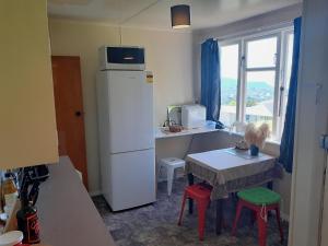 Η κουζίνα ή μικρή κουζίνα στο The Yellow Brick House +5 φωτογραφίες