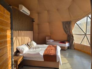 Postel nebo postele na pokoji v ubytování Star Luxury camp