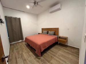 Postel nebo postele na pokoji v ubytování Casa Luna