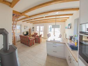 Kuchyň nebo kuchyňský kout v ubytování Ferienhaus Mit Atemberaubendem Blick Auf Den See