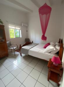 Ένα ή περισσότερα κρεβάτια σε δωμάτιο στο Centre Ste Anne plage & commerces à 200m