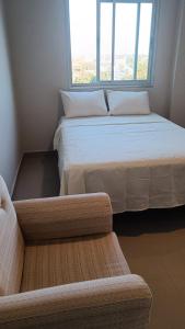 Ένα ή περισσότερα κρεβάτια σε δωμάτιο στο Apartamento1978