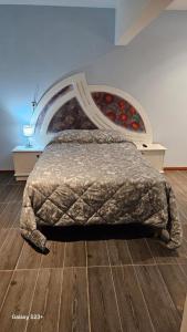 Ένα ή περισσότερα κρεβάτια σε δωμάτιο στο Casa Bigosh