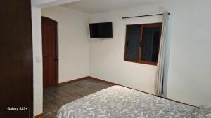 Ένα ή περισσότερα κρεβάτια σε δωμάτιο στο Casa Bigosh +2 φωτογραφίες