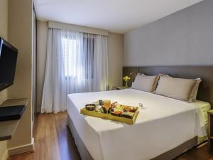 Postel nebo postele na pokoji v ubytování Mercure Sao Paulo Moema + 74 fotografií