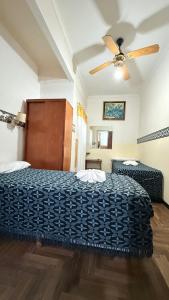 Postel nebo postele na pokoji v ubytování Hotel Nueva Marbella