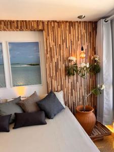 Giường trong phòng chung tại Studio da Praia 18º andar - Mega apartamento com vista panorâmica da Praia e da cidade