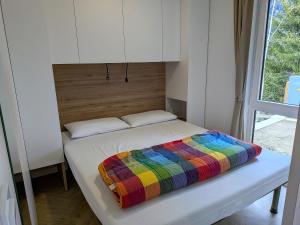 Postel nebo postele na pokoji v ubytování Camping Val di Sole