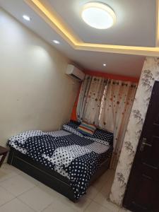 Ένα ή περισσότερα κρεβάτια σε δωμάτιο στο TheGeneral Place