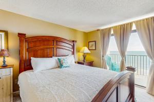 Ένα ή περισσότερα κρεβάτια σε δωμάτιο στο Verandas 906 +17 φωτογραφίες