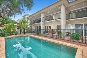 an image of a house with a swimming pool at Coral Views at Clifton Beach in Clifton Beach +7 photos