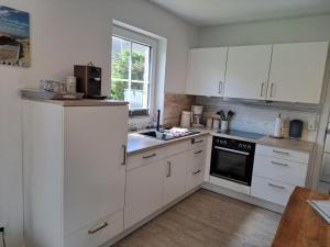 Kuchyň nebo kuchyňský kout v ubytování Sternstunde