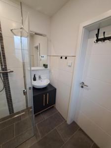 Koupelna v ubytování Sternstunde + 19 fotografií