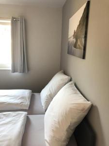 Postel nebo postele na pokoji v ubytování Westhook Ferienwohnung 1