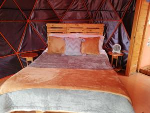 Postel nebo postele na pokoji v ubytování Glamping Cabaña San Martin