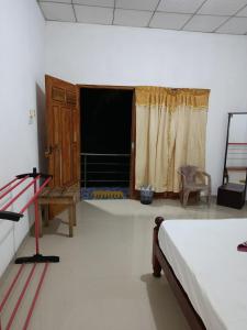 Ένα ή περισσότερα κρεβάτια σε δωμάτιο στο Yala Safari Green Hotel One