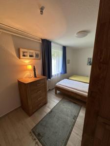 Postel nebo postele na pokoji v ubytování Hasenblick im Haus Inselheide
